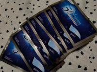 Multiple 5D White Teeth Whitening Strip packets fanned out - mint flavour, enamel safe with professional effects