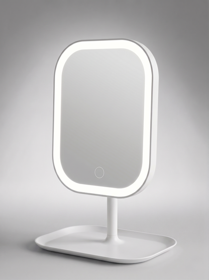 White LED makeup mirror with touch control button and rectangular storage tray base, illuminated against a grey background