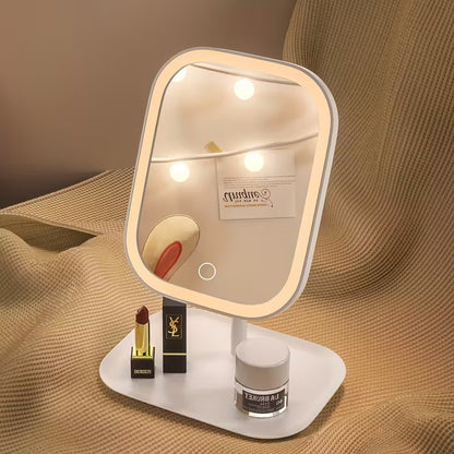 Lighted makeup mirror with cosmetic products on a textured surface